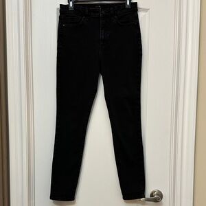 Joe's Jeans in a dark wash color.
